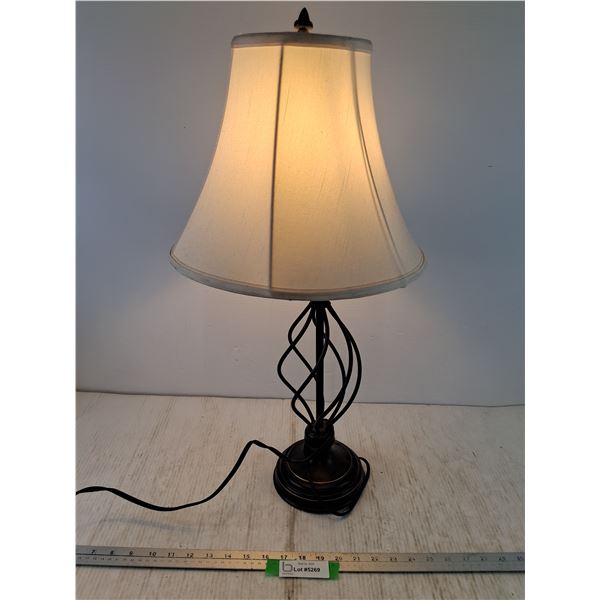 Table Lamp with Black Wrought Iron Base Powers On