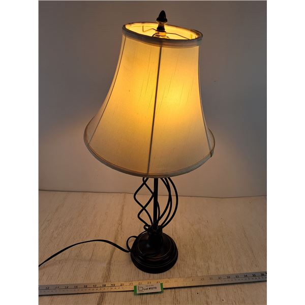 Table Lamp with Black Wrought Iron Base Powers On