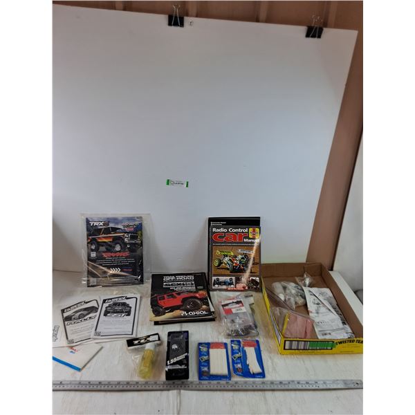 Assorted Radio Control Car Manuals, Accessories, Putty, Replacement Parts