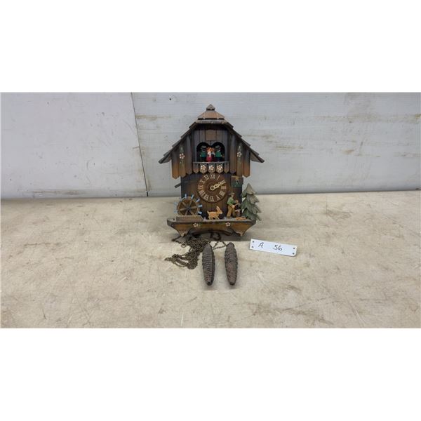 Black Forest Chalet-Style Cuckoo Clock with Dancing Figures, Woodchopper, and Waterwheel, No