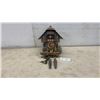 Image 1 : Black Forest Chalet-Style Cuckoo Clock with Dancing Figures, Woodchopper, and Waterwheel, No