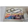 Image 2 : Aurora AFX Indy Special HO Scale Race Set, Manual, and Open Box of Track and Cars, NOS
