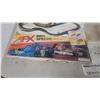 Image 4 : Aurora AFX Indy Special HO Scale Race Set, Manual, and Open Box of Track and Cars, NOS