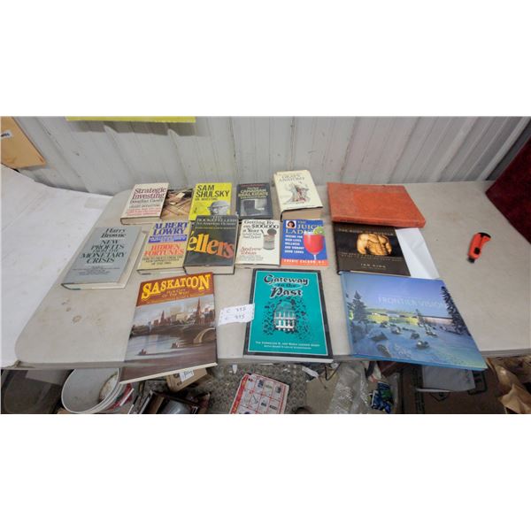 Assorted Books: *Saskatoon Hub City of the West*, *The Book of Muscle*, *Frontier Vision*