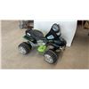 Image 1 : Power Wheels Black and Green ATV Ride-On Toy with Chrome Wheels and Footrests