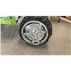 Image 4 : Power Wheels Black and Green ATV Ride-On Toy with Chrome Wheels and Footrests