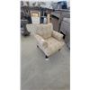 Image 1 : Upholstered Armchair with Dandelion-like Pattern and Black Legs
