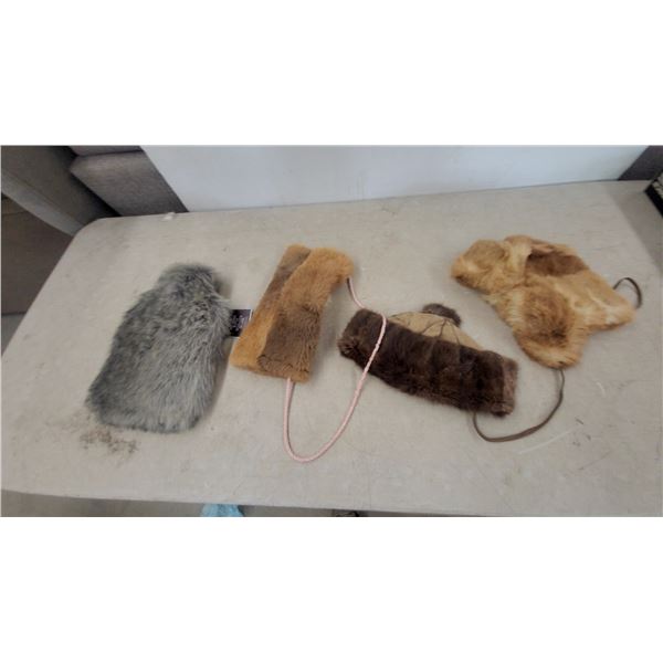 2 fur hats a pouch and water bottle