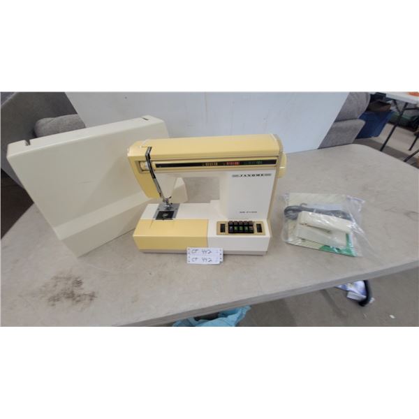 Janome SR2100 Sewing Machine, Foot Pedal, Power Cord, and Manuals