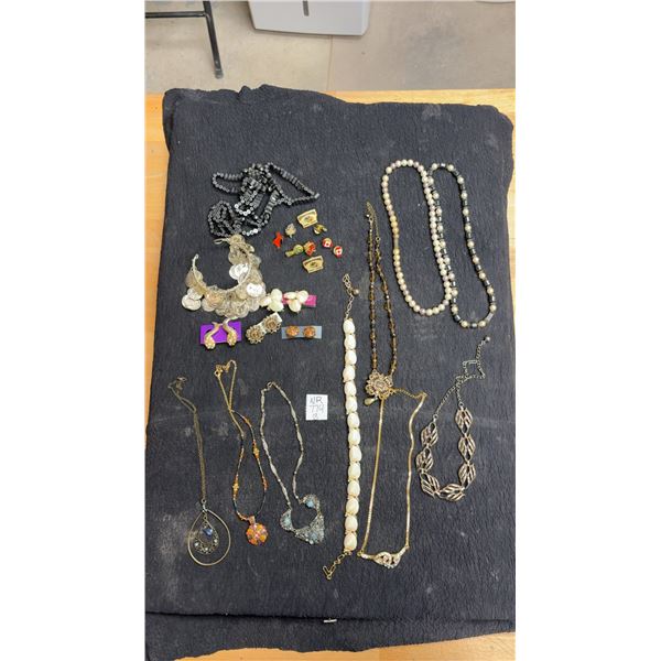 Assortment of Vintage Costume Jewelry Including Necklaces, Clip On Earrings, Charm Bracelet, and