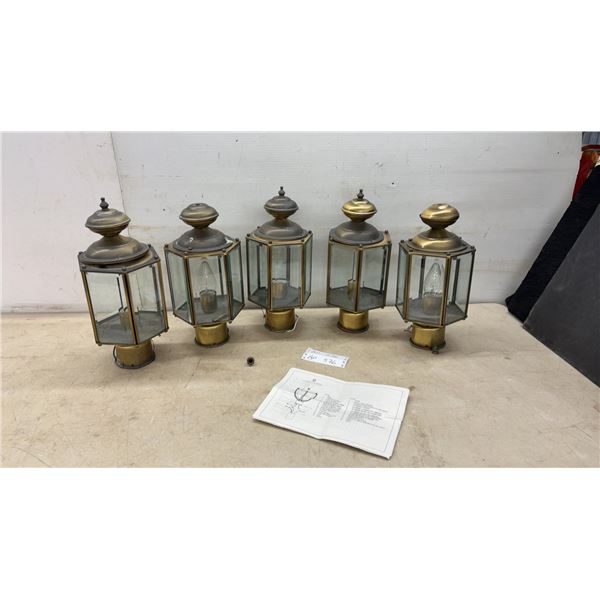 Five Hexagonal Brass Post Lanterns with Clear Glass Panels and Decorative Finial Tops