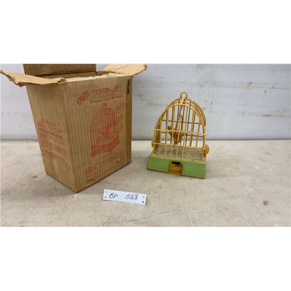 Vintage Irwin "Chirpee" Mechanical Singing Bird in Cage No. 672, Yellow and Green Plastic, With Box