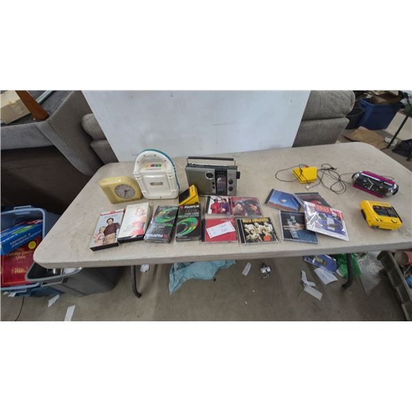 Vintage Electronics and Media: GE Alarm Clock, Cassette Player, Radio, VHS Tapes, CDs
