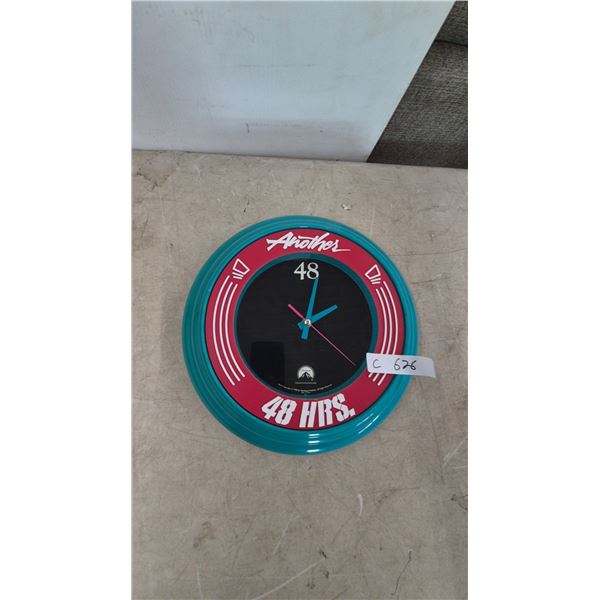 Another 48 Hrs. Wall Clock, Teal and Pink, Black Face, White Numerals and Text