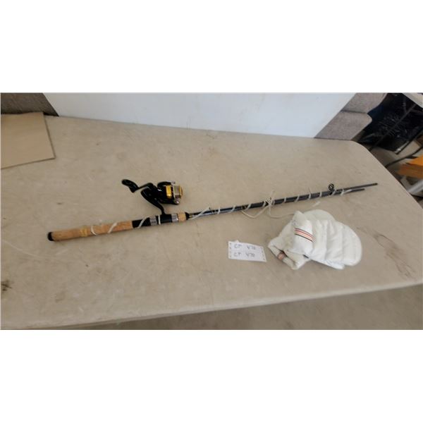 Fishing Rod and Reel, White Padded Mitt, and Paper Label