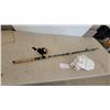 Image 1 : Fishing Rod and Reel, White Padded Mitt, and Paper Label