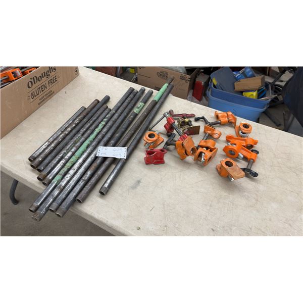 Assorted Pipe Clamps and Threaded Pipe Pieces