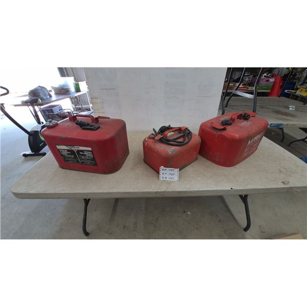 Three Outboard Motor Fuel Tanks: Quicksilver 3 Gal, Mariner, and Unbranded Tank with Hose