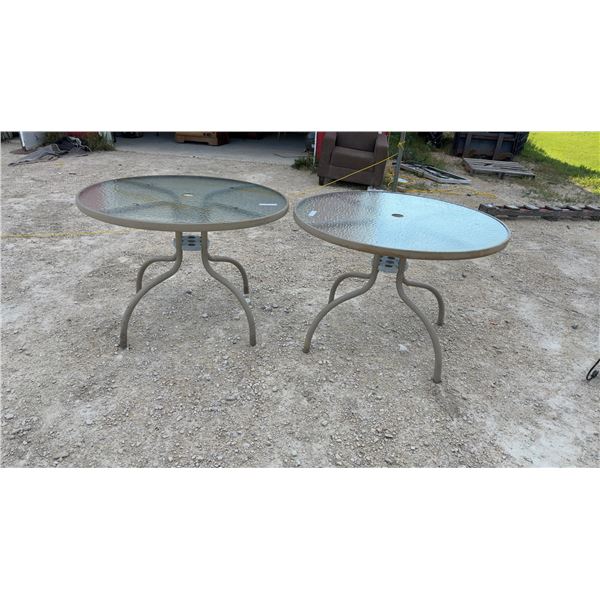 Two Round Glass-Top Patio Tables With Tan Metal Base and Umbrella Hole, 27 × 40”