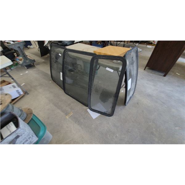 Four Vehicle Windows: 2 @ 28”×34” and 2 @ 16”×34”