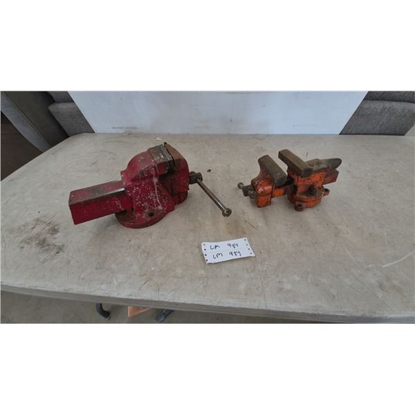 Two Vises: Red Bench Vise and Orange Bench Vise with Anvil