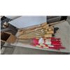 Image 1 : Assorted Bamboo Torches and Red and White Candles on Sticks with 2 jugs of citrolite