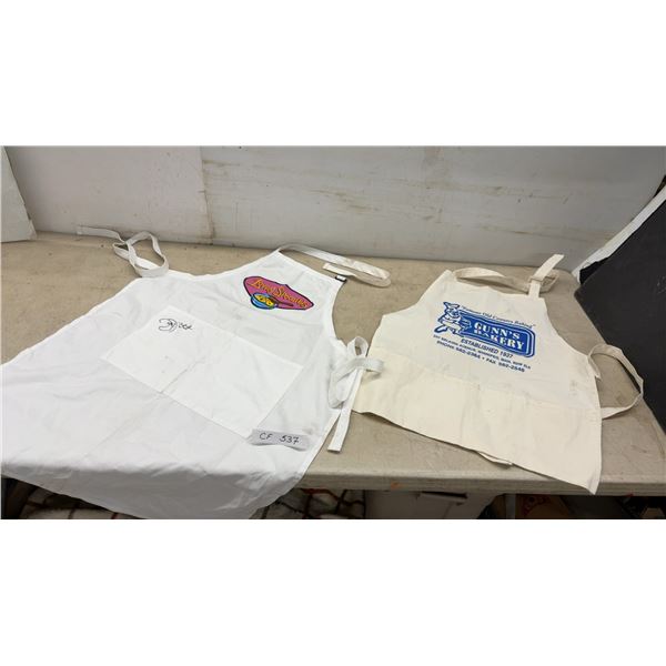 Two Promotional Aprons Including Loving Spoonfuls and Gunn's Bakery Winnipeg