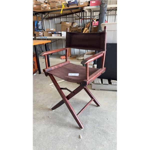 Folding Wooden Director's Chair with Reddish-Brown Frame and Dark Brown Canvas Seat and Back