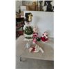 Image 1 : Christmas Decorations: Snowman Stand, Santa and Mrs. Claus Figures, Angel, Snowman, and Goose