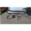 Image 2 : Type S LED Light Bar, EZ-TRAX Traction Mat, and 2 Oil Drain Pans