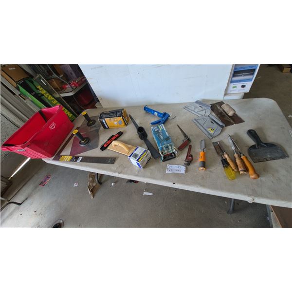 Assorted Hand Tools: Bostitch Stapler, Caulk Gun, Pickaxe, Chisels, Trowels