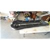 Image 1 : Black Plastic Sled with Two Ski Poles and Tow Rope