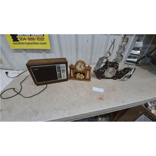Sony AM/FM Radio, United Fireplace Clock, and Ship's Wheel Clock