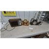 Image 1 : Sony AM/FM Radio, United Fireplace Clock, and Ship's Wheel Clock