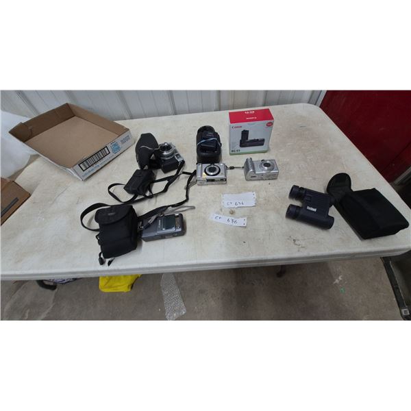 Canon BG-E5 Battery Grip, Canonet QL17 G-III, Panasonic Lumix DMC-FX01. Bushnell binoculars
