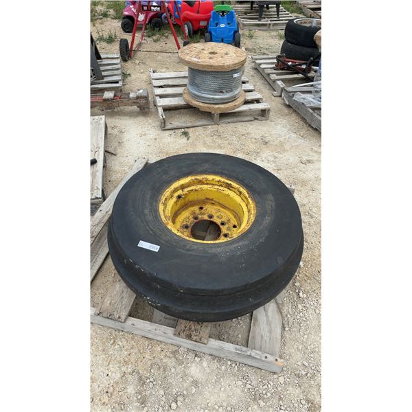 Goodyear 11.00-16SL Tire on Yellow Rim