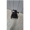 Image 3 : Compact Electric Heater with Power Cord and Handle