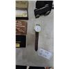 Image 3 : “The Golden Tool” Wrench and “How to Succeed in Business” Book
