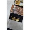 Image 4 : “The Golden Tool” Wrench and “How to Succeed in Business” Book