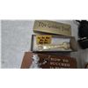 Image 5 : “The Golden Tool” Wrench and “How to Succeed in Business” Book