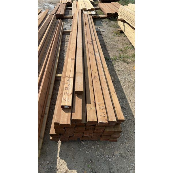 57 Brown Pressure Treated Lumber 2 × 4 × 14ft Boards