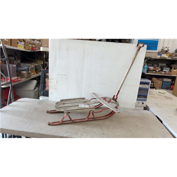 Vintage Flexible Flyer-Style Child's Sled with Wooden Deck and Red Metal Runners