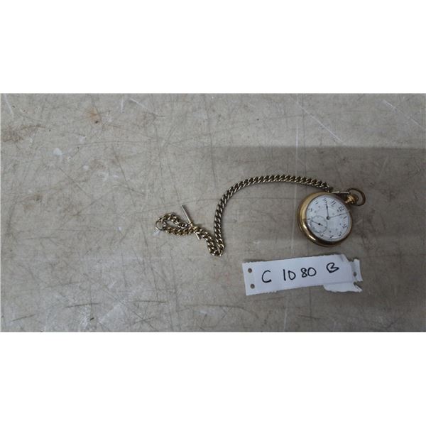 A Gold-Tone Pocket Watch with Chain and Fob