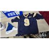 Image 2 : Grey Cup #FOR THE W Sign, Winnipeg Blue Bombers #9 Jersey, and Santa Hat