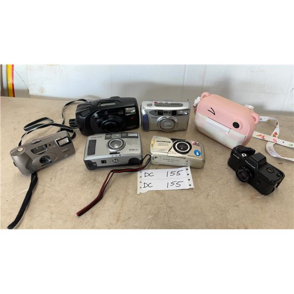 Lot of 7 Cameras: Vivitar, Kodak Advantix 1600 auto, Pentax auto 110, Easy Shot ES38D EV, Olympus S