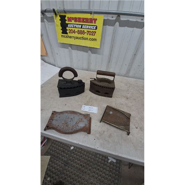 Antique Sad Irons and Trivets: 2 Cast Iron Sad Irons, 2 Cast Iron Trivets