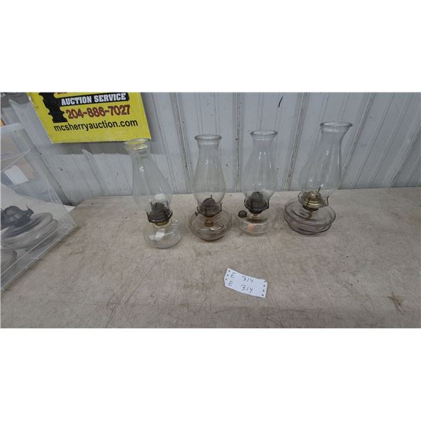 Four Clear Glass Oil Lamps with Chimneys and Burners