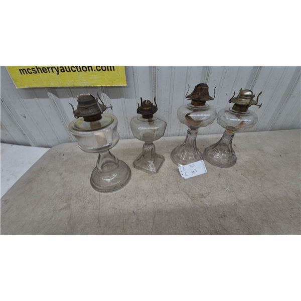 Four Clear Glass Oil Lamps with Metal Burners and Wicks