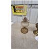Image 2 : Three Oil Lamps: 1 Brass Base and Clear Glass Font, 1 Brass Base and Clear Glass Font, 1 Red Base.