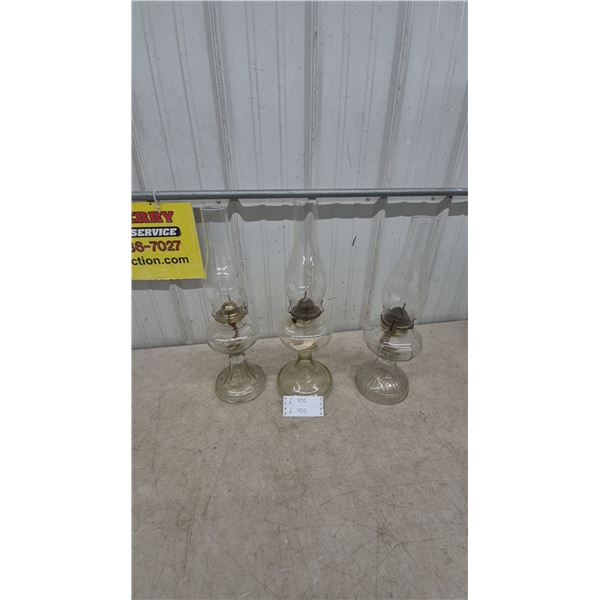 Three Clear Glass Oil Lamps with Chimneys and Wicks